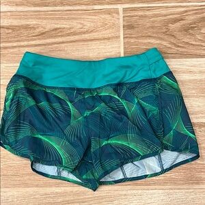 Nike Green Athletic Shorts with Lightweight Fabric and Tropical Leaf Print